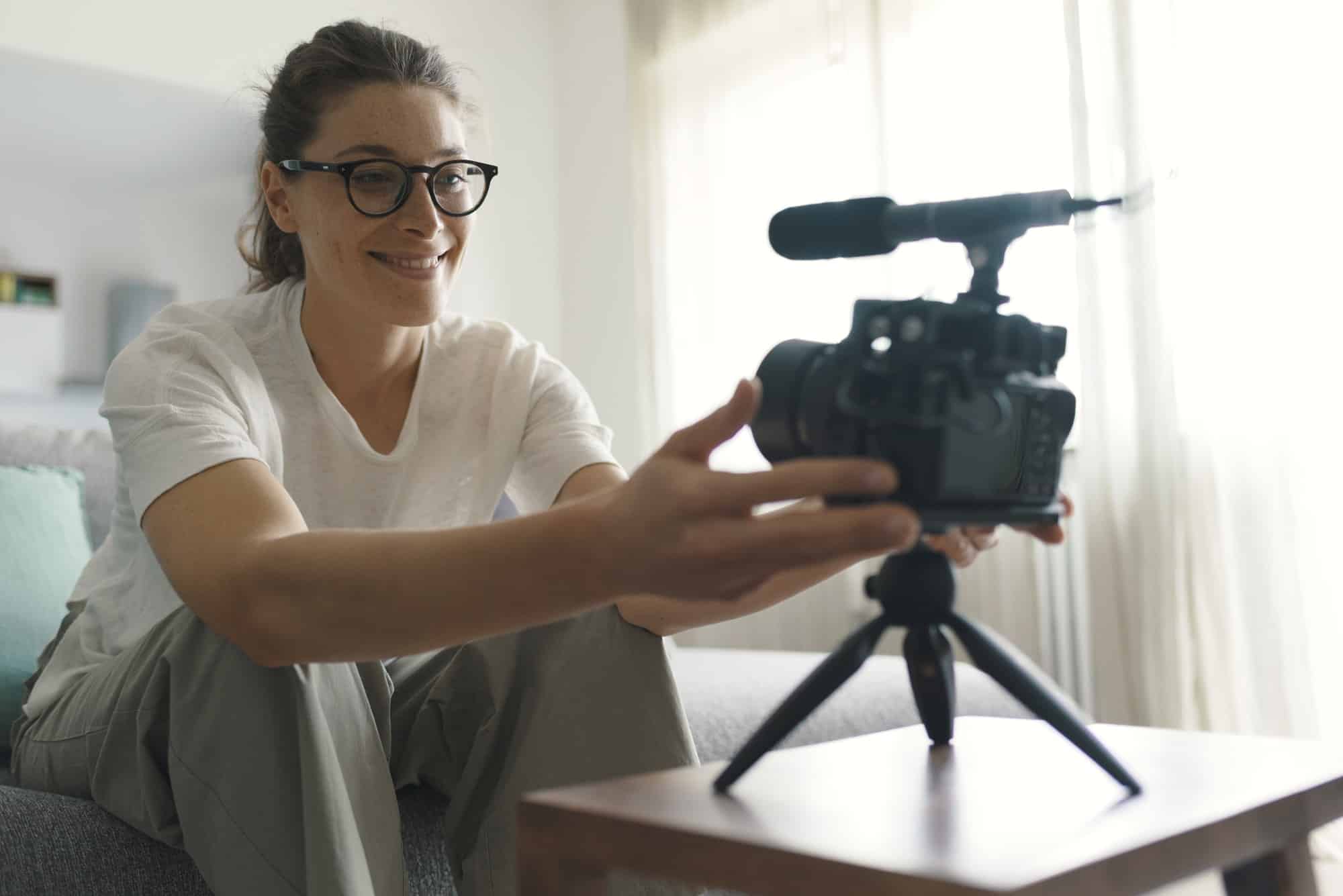 Youtuber recording a video in the living room