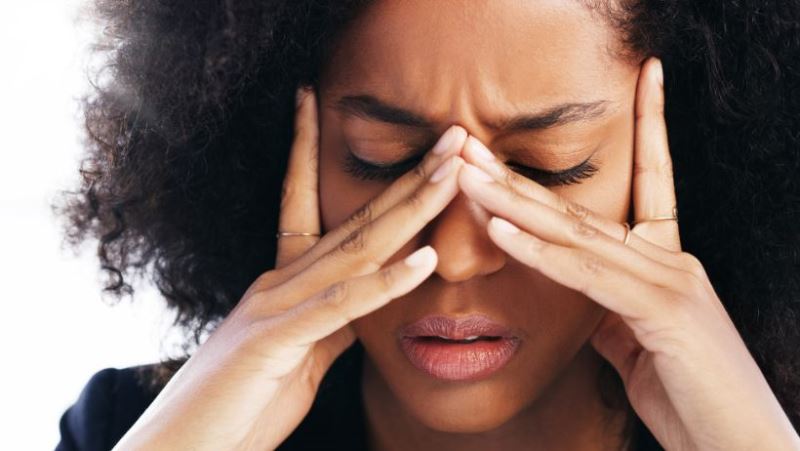 Une femme en burn-out à cause du stress