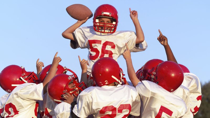 Une équipe de football américain avec une bonne cohésion grâce à la préparation mentale