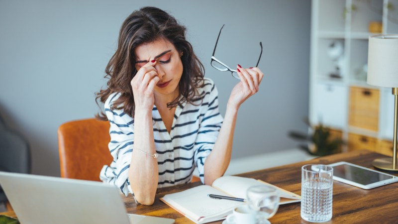 Une chef d'entreprise qui subit les conséquences d'une absence de coaching mental